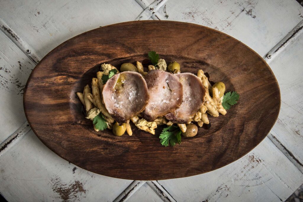 "SKIOUFIKTO pasta" with green olive pesto